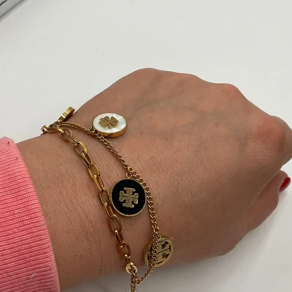 Tory Burch Gold Bracelet with Red, White, and Black Charms - Picture 5 of 5